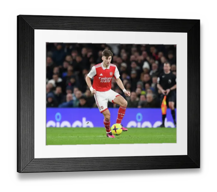 Framed Print : Arsenal's Kieran Tierney Faces Off Against Tottenham Hotspur in Intense Premier League Clash, 2022-23