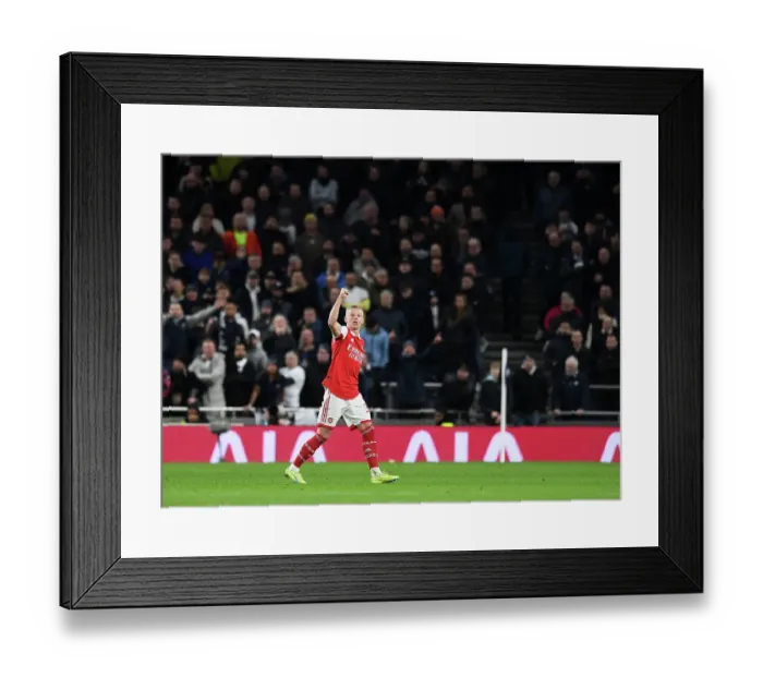 Framed Print : Arsenal's Oleksandr Zinchenko Raises Fist to Fans Amidst Dramatic Tottenham Clash (2022-23) Framed Print : Arsenal's Oleksandr Zinchenko Raises Fist to Fans Amidst Dramatic Tottenham Clash (2022-23)