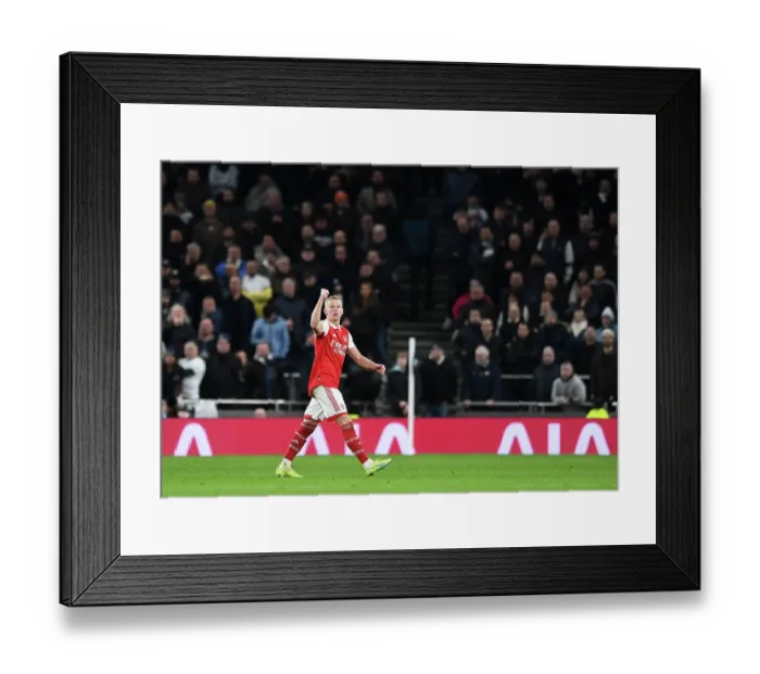 Framed Print : Zinchenko's Defiant Gesture: Arsenal Star Raises Fist to Fans Amidst Intense Tottenham Rivalry (2022-23)