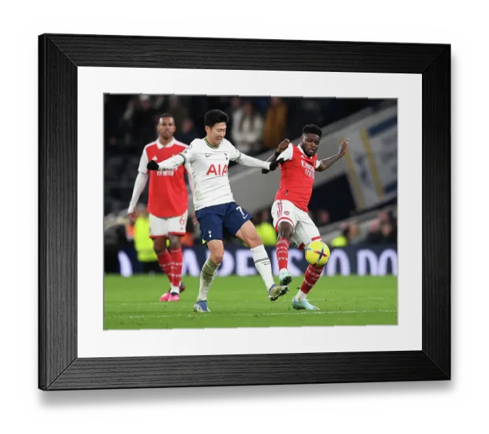 Framed Print : Partey vs. Son: Intense Battle in the Premier League Clash between Tottenham and Arsenal Framed Print : Partey vs. Son: Intense Battle in the Premier League Clash between Tottenham and Arsenal