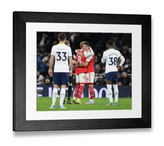 Framed Print : Arsenal's Martin Odegaard and Granit Xhaka in Action Against Tottenham Hotspur in the Premier League Framed Print : Arsenal's Martin Odegaard and Granit Xhaka in Action Against Tottenham Hotspur in the Premier League