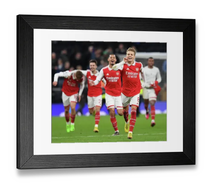Framed Print : Martin Odegaard's Stunner: Arsenal's Premier League Victory Over Tottenham Framed Print : Martin Odegaard's Stunner: Arsenal's Premier League Victory Over Tottenham