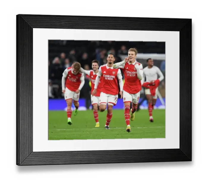 Framed Print : Martin Odegaard's Thrilling Goal: Arsenal's Premier League Victory Over Tottenham (2022-23)