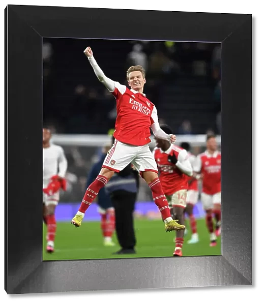 Martin Odegaard's Celebration: Arsenal's Victory Over Tottenham Hotspur in the Premier League (2022-23)