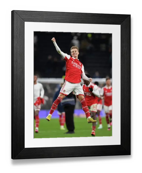 Framed Print : Martin Odegaard's Celebration: Arsenal's Victory Over Tottenham Hotspur in the Premier League (2022-23) Framed Print : Martin Odegaard's Celebration: Arsenal's Victory Over Tottenham Hotspur in the Premier League (2022-23)