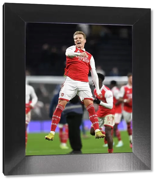 Martin Odegaard's Goal: Arsenal Celebrates Premier League Victory Over Tottenham Hotspur