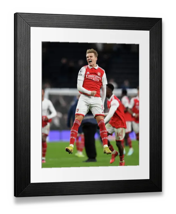 Framed Print : Martin Odegaard's Euphoria: Arsenal's Triumph Over Tottenham Hotspur in the Premier League (January 2023)