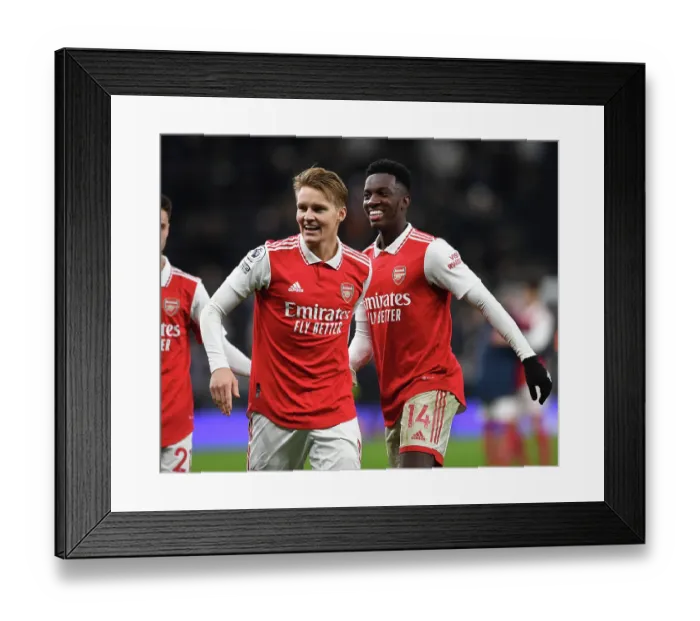 Framed Print : Arsenal's Martin Odegaard and Eddie Nketiah in Action against Tottenham Hotspur - Premier League 2022-23
