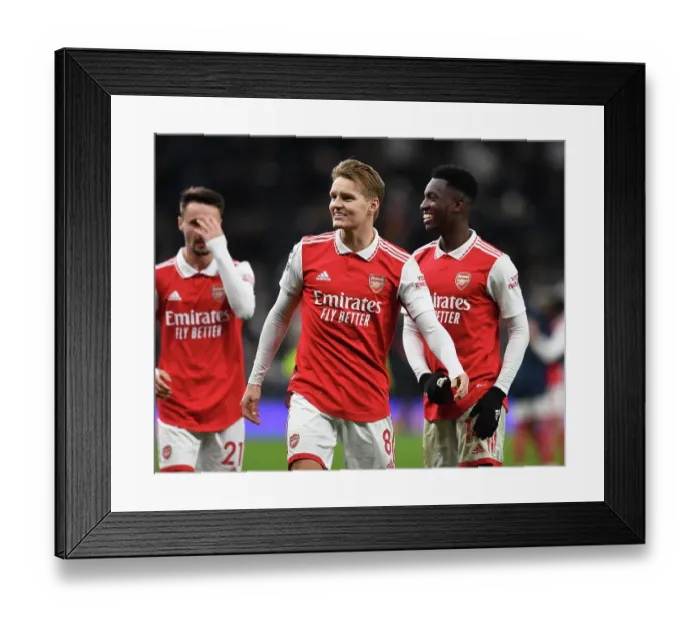 Framed Print : Martin Odegaard Scores Game-Winning Goal: Arsenal Triumphs Over Tottenham Hotspur in Premier League Clash