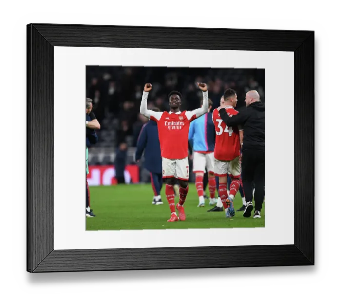 Framed Print : Arsenal's Bukayo Saka Celebrates Goal Against Tottenham in Premier League Clash (2022-23)