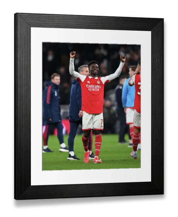 Framed Print : Saka's Celebration: Arsenal's Victory Over Tottenham in the Premier League (2022-23) Framed Print : Saka's Celebration: Arsenal's Victory Over Tottenham in the Premier League (2022-23)