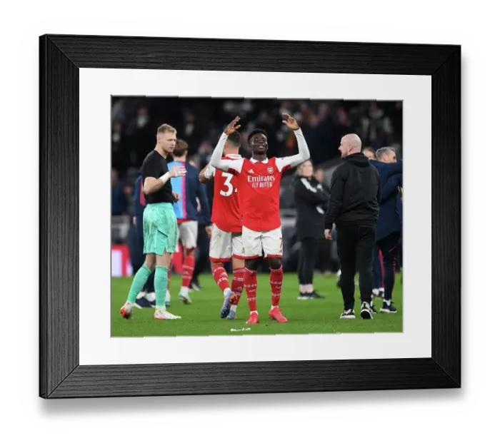 Framed Print : Bukayo Saka's Thrilling Goal: Arsenal's Triumph in the Exciting Tottenham Derby, Premier League 2022-23