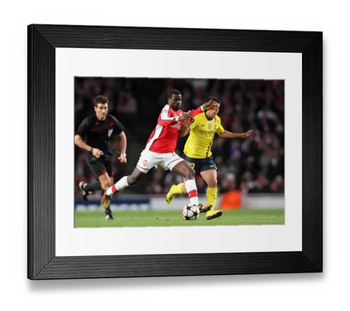 Framed Print : Emmanuel Eboue (Arsenal) Pedro Rodriguez (Barcelona). Arsenal 2: 2 Barcelona Framed Print : Emmanuel Eboue (Arsenal) Pedro Rodriguez (Barcelona). Arsenal 2: 2 Barcelona