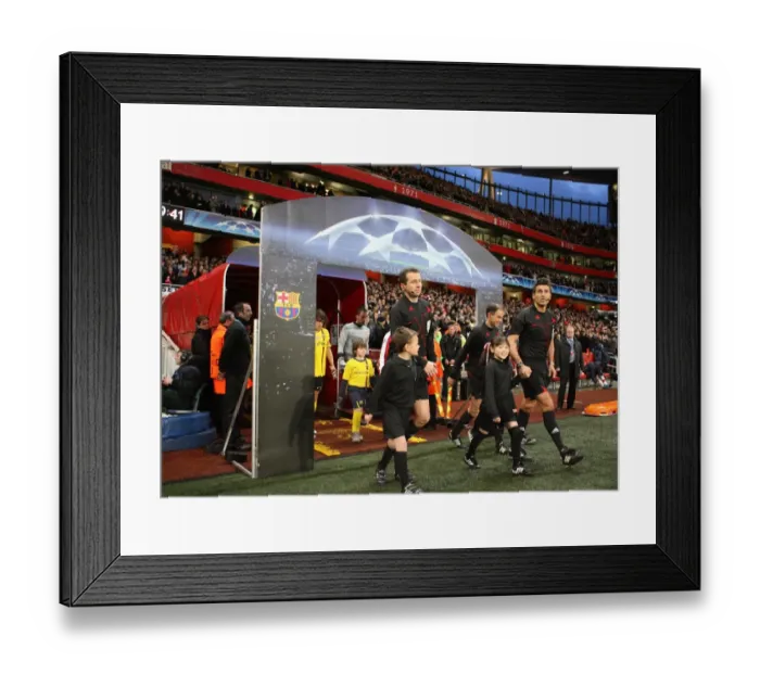 Framed Print : The Referees walk out with the mascots. Arsenal 2: 2 Barcelona. UEFA Champions League