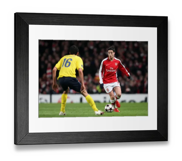 Framed Print : Samir Nasri (Arsenal) Sergio Busquets (Barcelona). Arsenal 2: 2 Barcelona Framed Print : Samir Nasri (Arsenal) Sergio Busquets (Barcelona). Arsenal 2: 2 Barcelona