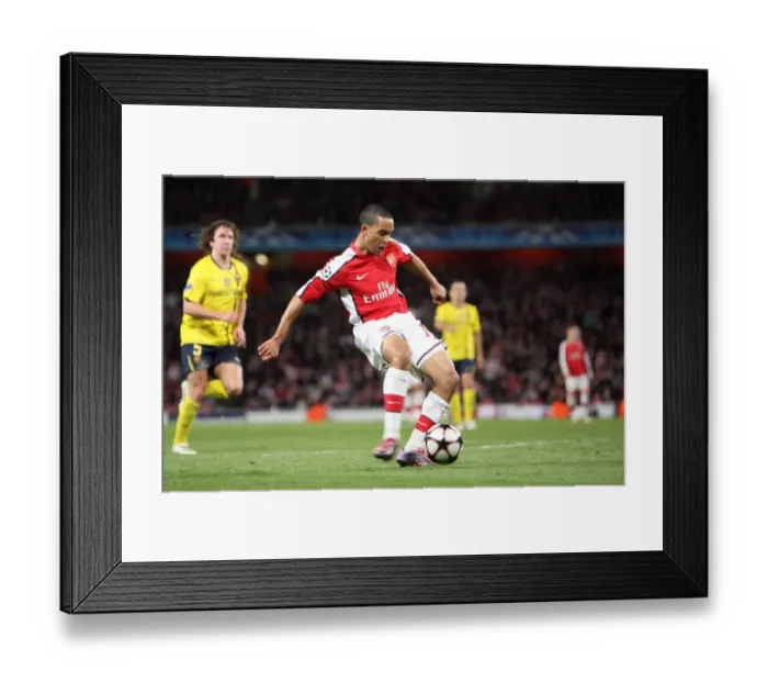 Framed Print : Theo Walcott's Stunner: Arsenal's First Goal vs. Barcelona in the Champions League Quarterfinal