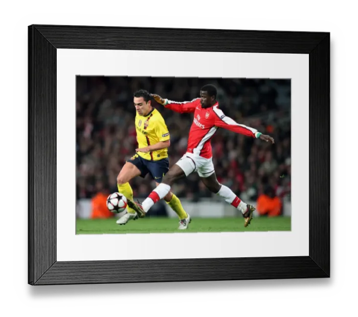 Framed Print : Samir Nasri (Arsenal) Daniel Alves (Barcelona). Arsenal 2: 2 Barcelona. UEFA Champions League Framed Print : Samir Nasri (Arsenal) Daniel Alves (Barcelona). Arsenal 2: 2 Barcelona. UEFA Champions League