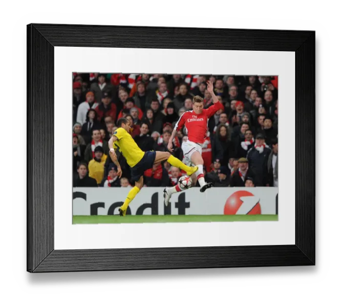 Framed Print : Arsenal vs Barcelona: Bendtner vs Alves - Thrilling 2-2 Stalemate in the Champions League Quarterfinals