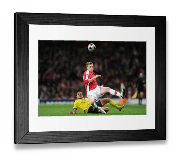Framed Print : Arsenal vs. Barcelona: Bendtner vs. Alves - Thrilling 2:2 Stalemate in the Champions League Quarterfinals