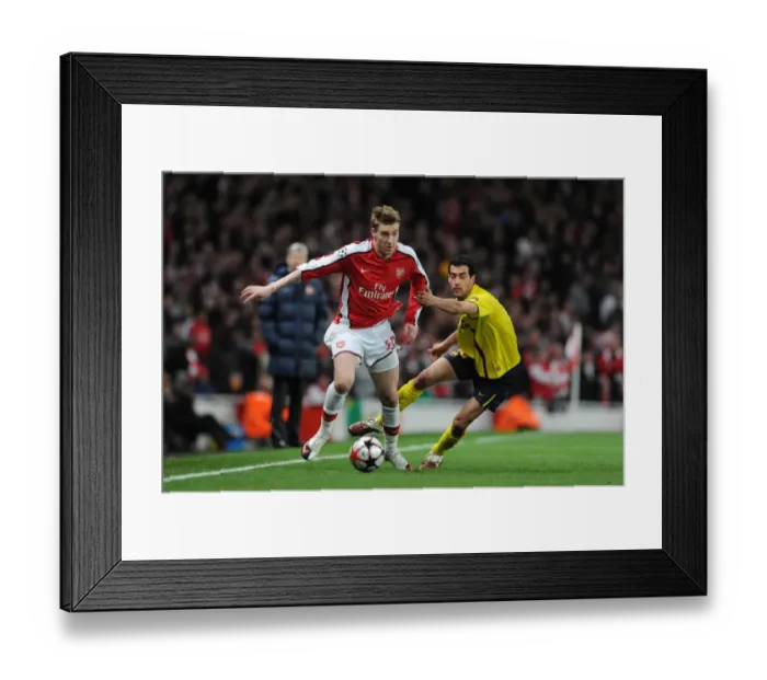 Framed Print : Bendtner vs. Busquets: Thrilling Quarter-Final Showdown - Arsenal 2-2 Barcelona Framed Print : Bendtner vs. Busquets: Thrilling Quarter-Final Showdown - Arsenal 2-2 Barcelona