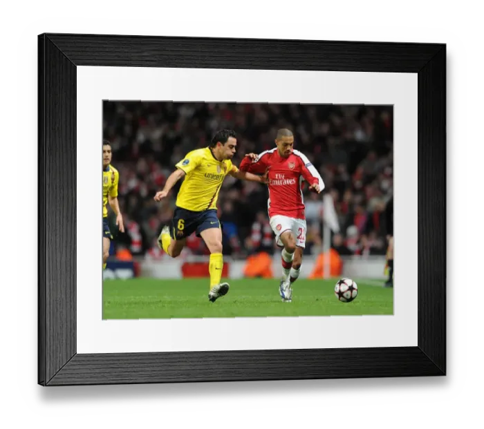 Framed Print : Gael Clichy (Arsenal) Xavi (Barcelona). Arsenal 2: 2 Barcelona, UEFA Champions League Framed Print : Gael Clichy (Arsenal) Xavi (Barcelona). Arsenal 2: 2 Barcelona, UEFA Champions League