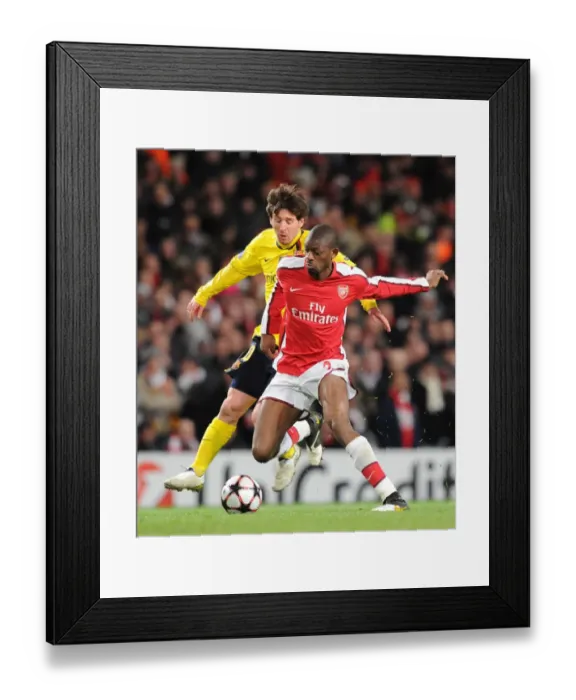 Framed Print : Thrilling 2-2 Draw: Abou Diaby vs. Lionel Messi in Arsenal's 2010 UEFA Champions League Quarterfinal Framed Print : Thrilling 2-2 Draw: Abou Diaby vs. Lionel Messi in Arsenal's 2010 UEFA Champions League Quarterfinal