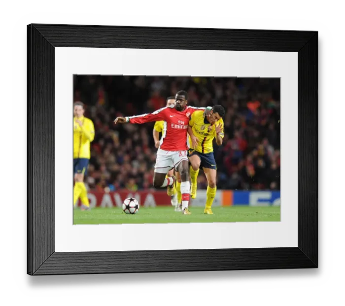 Framed Print : Emmanuel Eboue (Arsenal) Sergio Busquets (Barcelona). Arsenal 2: 2 Barcelona Framed Print : Emmanuel Eboue (Arsenal) Sergio Busquets (Barcelona). Arsenal 2: 2 Barcelona