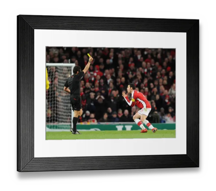 Framed Print : Cesc Fabregas (Arsenal) is booked by referee Massimo Busacca. Arsenal 2: 2 Barcelona Framed Print : Cesc Fabregas (Arsenal) is booked by referee Massimo Busacca. Arsenal 2: 2 Barcelona
