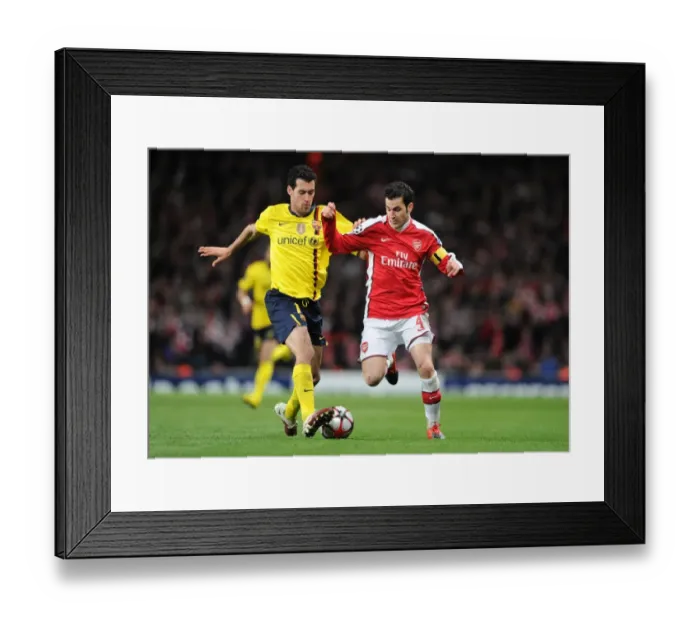 Framed Print : Cesc Fabregas (Arsenal) Sergio Busquets (Barcelona). Arsenal 2: 2 Barcelona