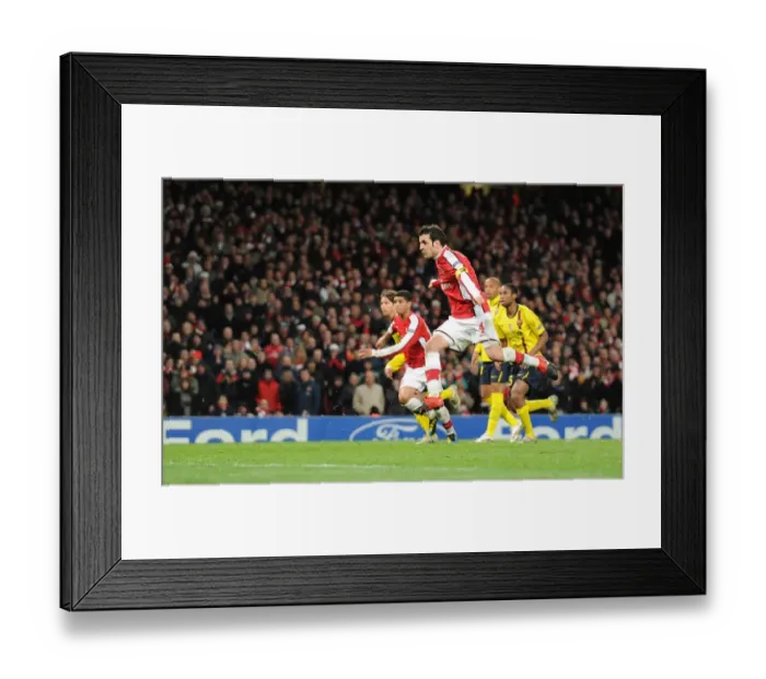 Framed Print : Cesc Fabregas shoots past Barcelona goalkeeper Victor Valdes to score the 2nd Arsenal goal
