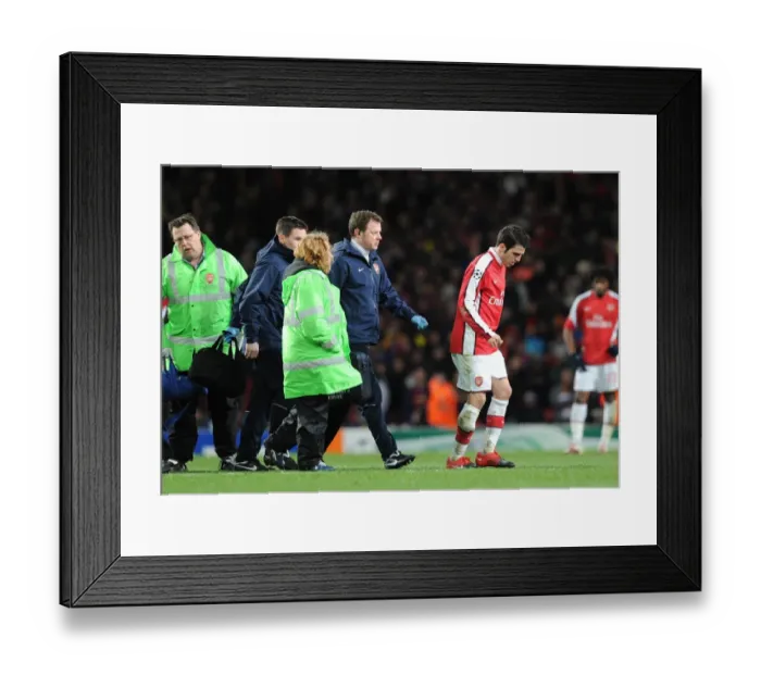 Framed Print : Cesc Fabregas Injured: Arsenal Captain Limps Off Against Barcelona in UEFA Champions League Quarterfinal Framed Print : Cesc Fabregas Injured: Arsenal Captain Limps Off Against Barcelona in UEFA Champions League Quarterfinal