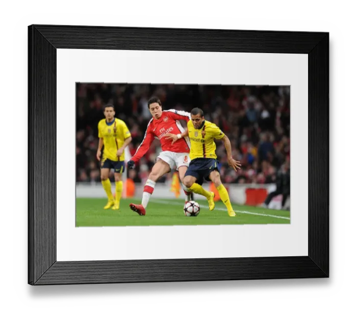 Framed Print : Thrilling Quarter-Final Draw: Samir Nasri vs. Daniel Alves - Arsenal vs. Barcelona, UEFA Champions League