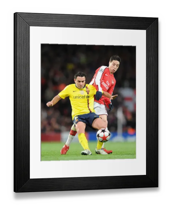 Framed Print : Samir Nasri (Arsenal) Xavi (Barcelona). Arsenal 2: 2 Barcelona, UEFA Champions League
