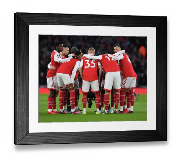 Framed Print : Arsenal FC vs Manchester United: Pre-Match Huddle - Arsenal's Nketiah and White Focused