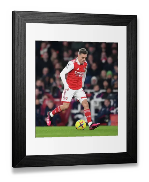 Framed Print : Trossard Shines: Arsenal's Star Performance Overpowers Manchester United (Premier League 2022-23)