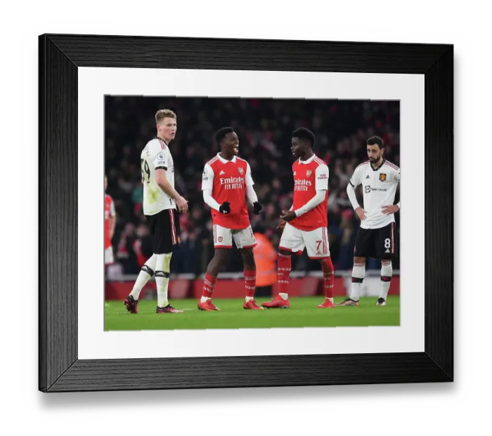 Framed Print : Arsenal's Eddie Nketiah Scores Controversial Goal Against Manchester United in Premier League Showdown Framed Print : Arsenal's Eddie Nketiah Scores Controversial Goal Against Manchester United in Premier League Showdown