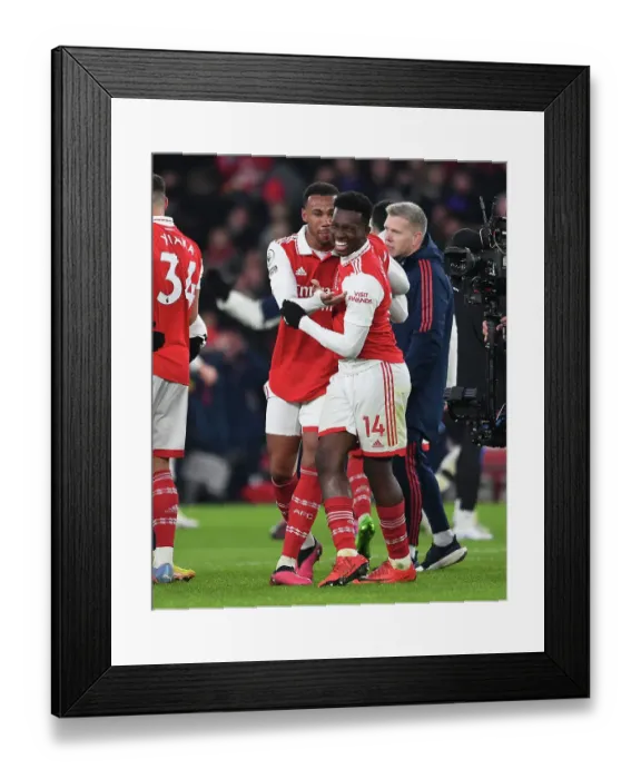 Framed Print : Arsenal's Premier League Victory: Magalhaes and Nketiah Celebrate Over Manchester United Framed Print : Arsenal's Premier League Victory: Magalhaes and Nketiah Celebrate Over Manchester United