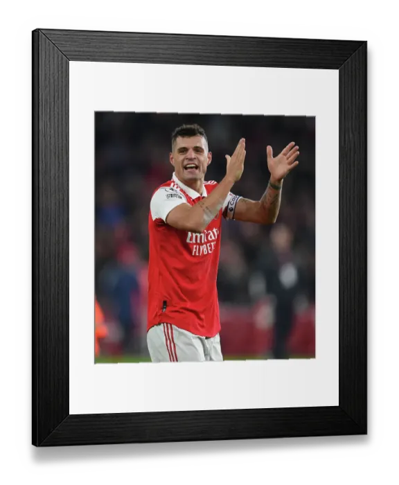 Framed Print : Arsenal's Granit Xhaka Celebrates with Fans after Arsenal v Manchester United in 2022-23 Premier League Framed Print : Arsenal's Granit Xhaka Celebrates with Fans after Arsenal v Manchester United in 2022-23 Premier League