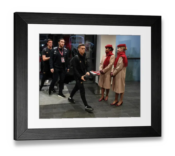 Framed Print : Arsenal's Trossard Arrives at Emirates Stadium Ahead of Manchester United Clash (2022-23)