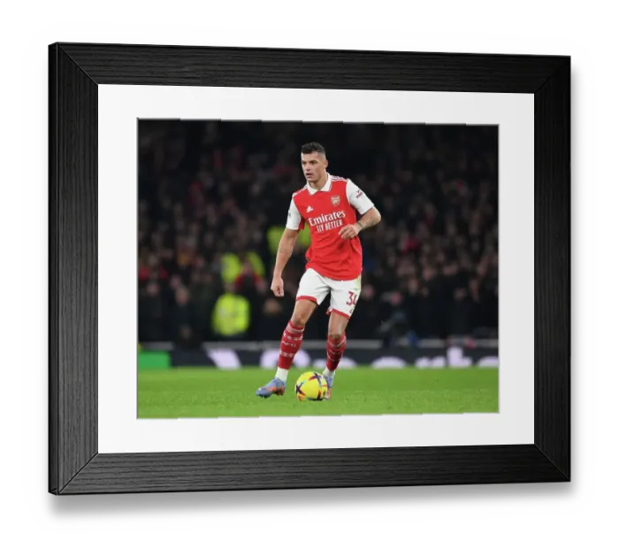 Framed Print : Granit Xhaka in Action: Arsenal vs Manchester United, Premier League 2022-23 Framed Print : Granit Xhaka in Action: Arsenal vs Manchester United, Premier League 2022-23