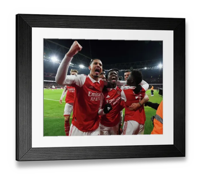 Framed Print : Arsenal's Bukayo Saka, Willian Saliba, and Eddie Nketiah Celebrate Goals Against Manchester United (2022-23) Framed Print : Arsenal's Bukayo Saka, Willian Saliba, and Eddie Nketiah Celebrate Goals Against Manchester United (2022-23)