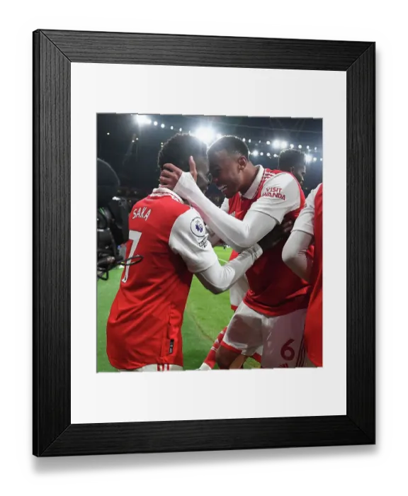Framed Print : Arsenal's Bukayo Saka and Gabriel Celebrate Goals Against Manchester United in 2022-23 Premier League