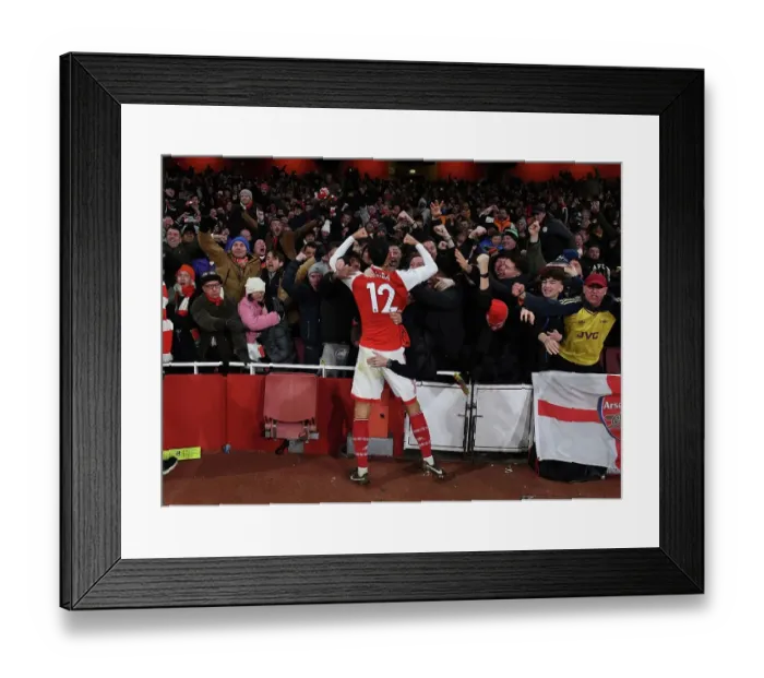 Framed Print : Saliba's Stunner: Arsenal Fans Go Wild as Third Goal Secures Victory Over Manchester United (2022-23)