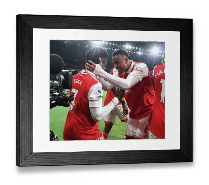 Framed Print : Arsenal's Saka and Gabriel: Celebrating Glory Over Manchester United (2022-23) Framed Print : Arsenal's Saka and Gabriel: Celebrating Glory Over Manchester United (2022-23)