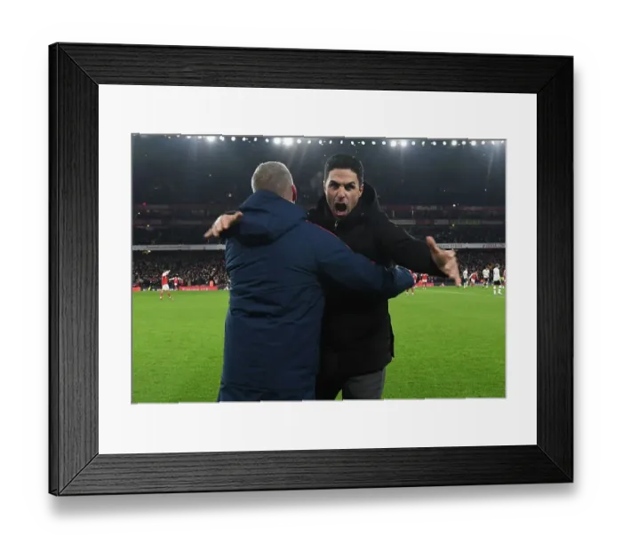 Framed Print : Arsenal Celebrate Hard-Fought Victory Over Manchester United in Premier League Clash