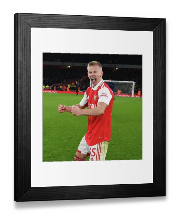 Framed Print : Arsenal's Zinchenko Leads Victory Celebrations Over Manchester United in Premier League Showdown Framed Print : Arsenal's Zinchenko Leads Victory Celebrations Over Manchester United in Premier League Showdown