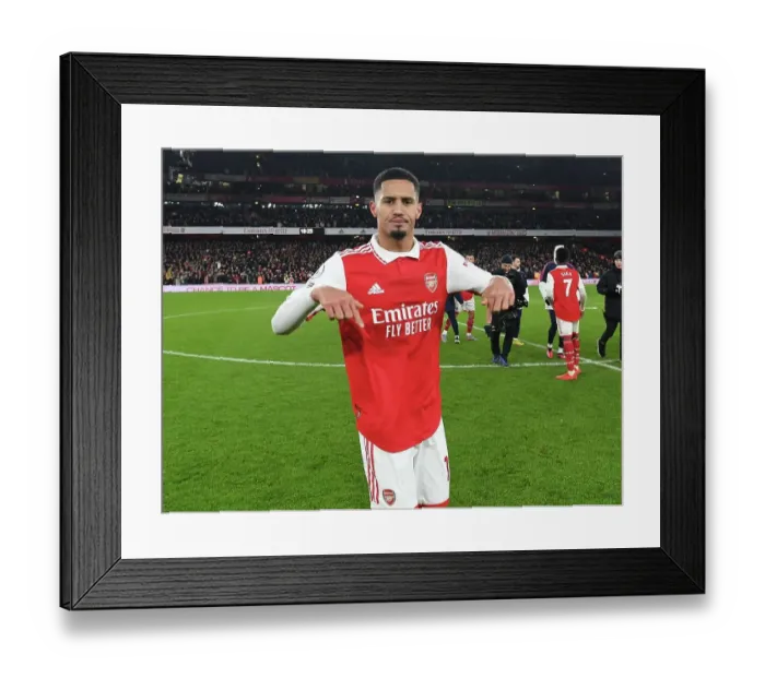 Framed Print : Arsenal's Triumphant Victory Over Manchester United: William Saliba's Emotional Celebration (2022-23)