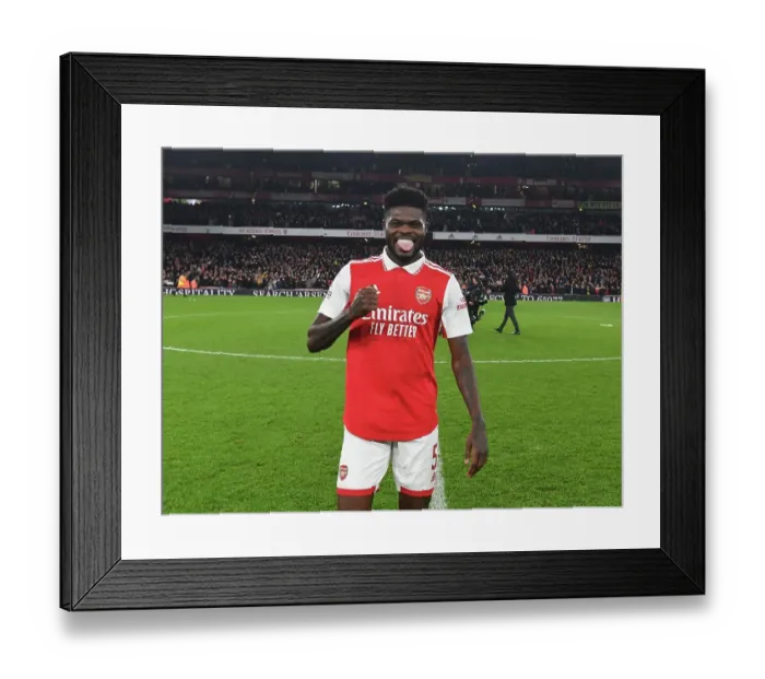 Framed Print : Thomas Partey's Celebration: Arsenal FC Triumphs Over Manchester United in the Premier League (2022-23)