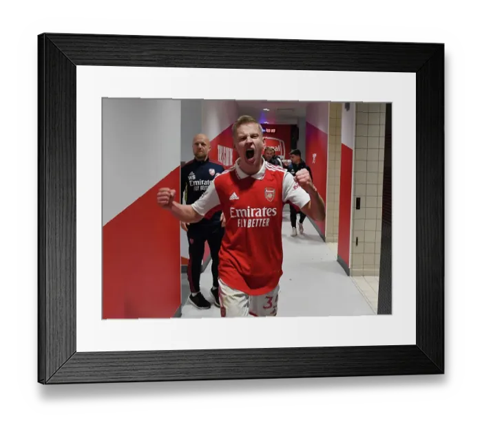 Framed Print : Arsenal Celebrate Victory Over Manchester United in Premier League Clash