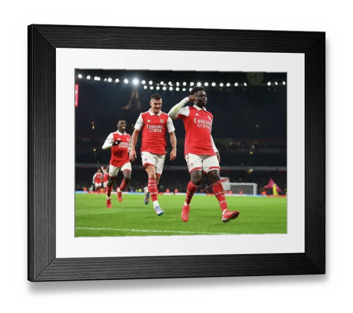 Framed Print : Saka's Brace: Arsenal Secures Premier League Victory Over Manchester United (2022-23)
